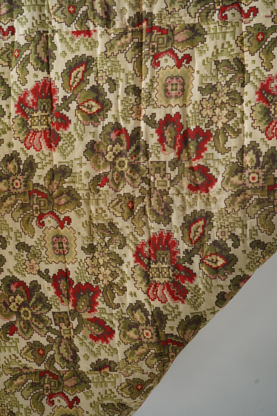 A bold handsome, American, Vermont 1865 (Civil War) ‘basket’ and lattice, hand quilted and piece tied bedcover, with an ornate floral backing. Worked with a plain navy cotton lattice border around central stylised printe